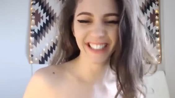 Hot young brunette masturbating live on cam
