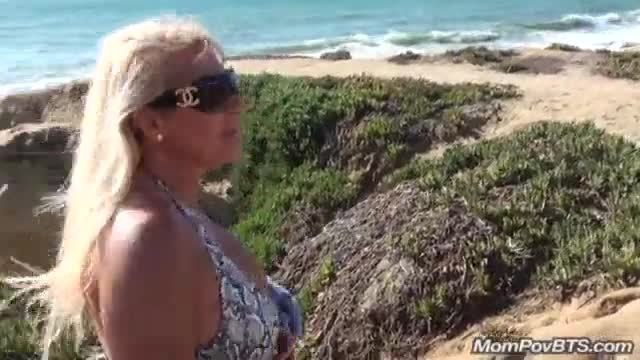 Busty milf beach flashing tits