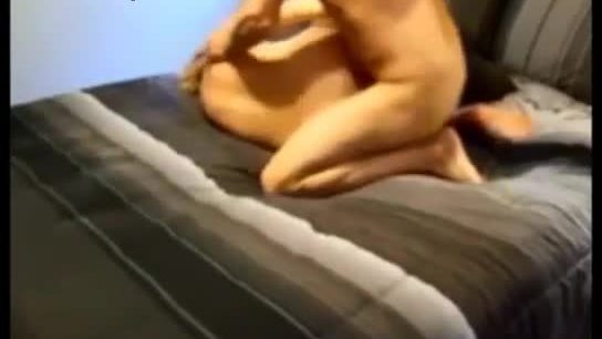 Real mature couple having sex on home sofa